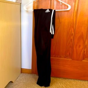 Black addias joggers. With the white stripes on the sides.